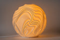 Flow Sculpted sfeerlamp met warm licht en vloeiende sculpturale lijnen