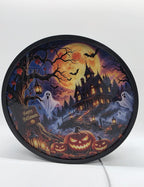 Ronde Halloween lichtbak van circa 27 cm met geprint acrylaat en zwarte rand.
