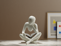 NOBody Reader abstracte sculptuur van een lezende figuur in marble.